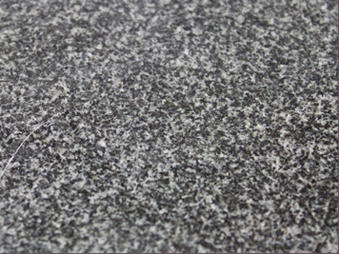 Brits granite sample — Medium grey with an even, fine-grain pattern.
