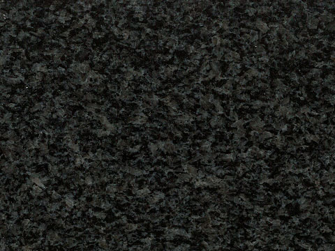 Dark Brits granite sample — Deep grey with a dense, dark grain.